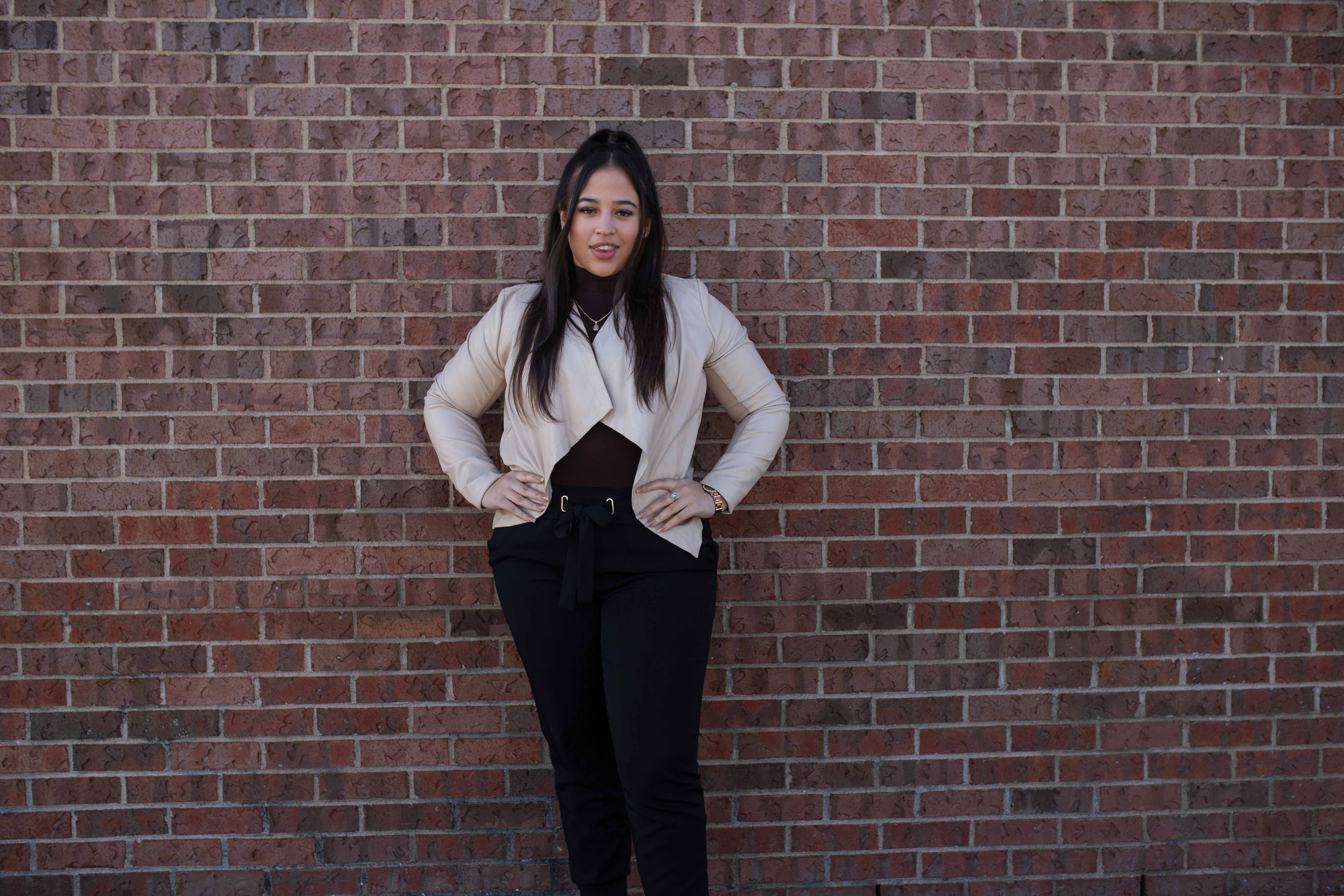 Jody Upshaw outside of brick building